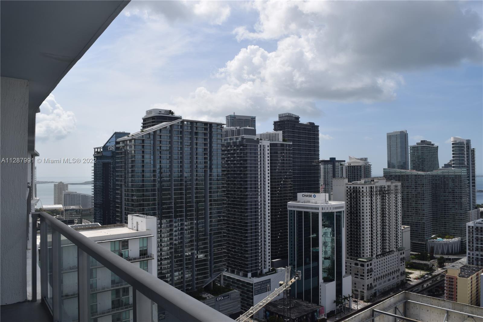 a view of a city with tall buildings