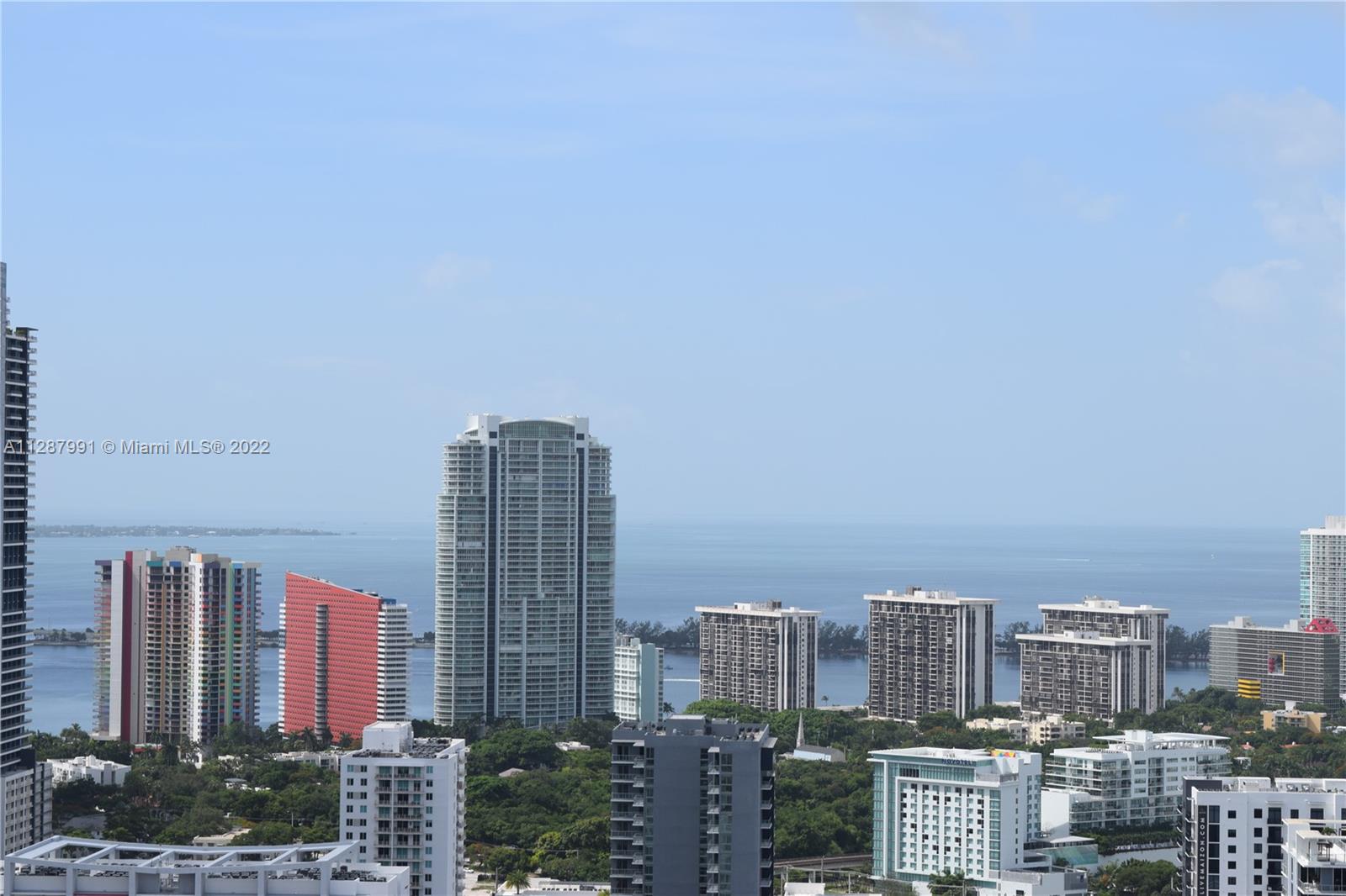185 Southwest 7th Street, Unit 4014 Miami, FL 33130 - Photo 3 of 21 a view of a city with tall buildings in the background