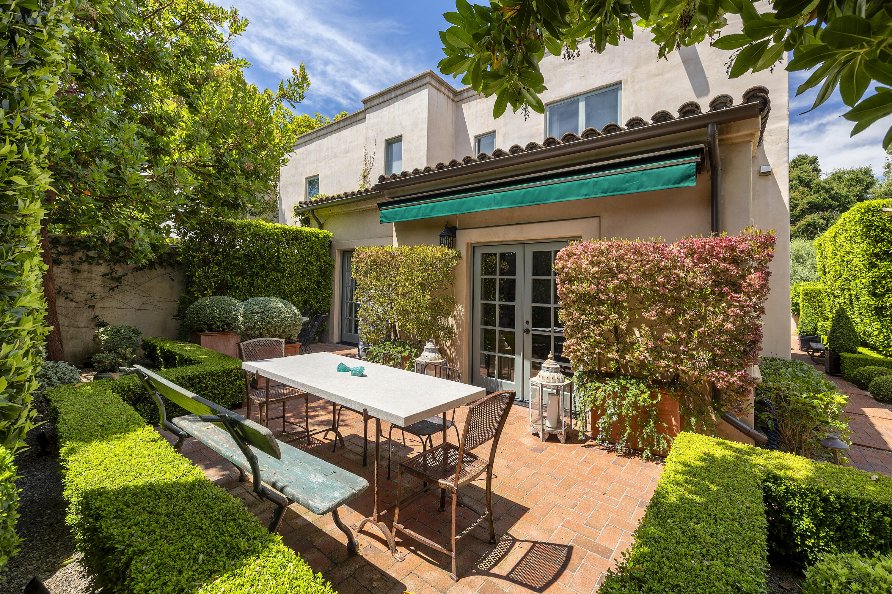 85 Depot Road Montecito, CA 93108 - Photo 12 of 14 a view of a patio with table and chairs and potted plants