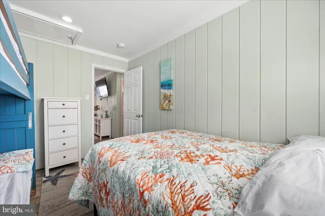 a bedroom with a bed and a closet