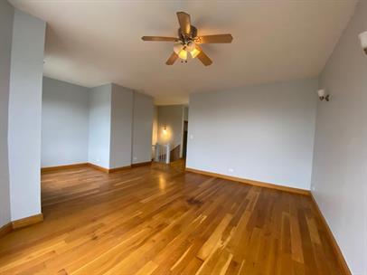 4221 South Union Avenue, Unit 3 Chicago, IL 60609 - Photo 4 of 16 a view of empty room with wooden floor