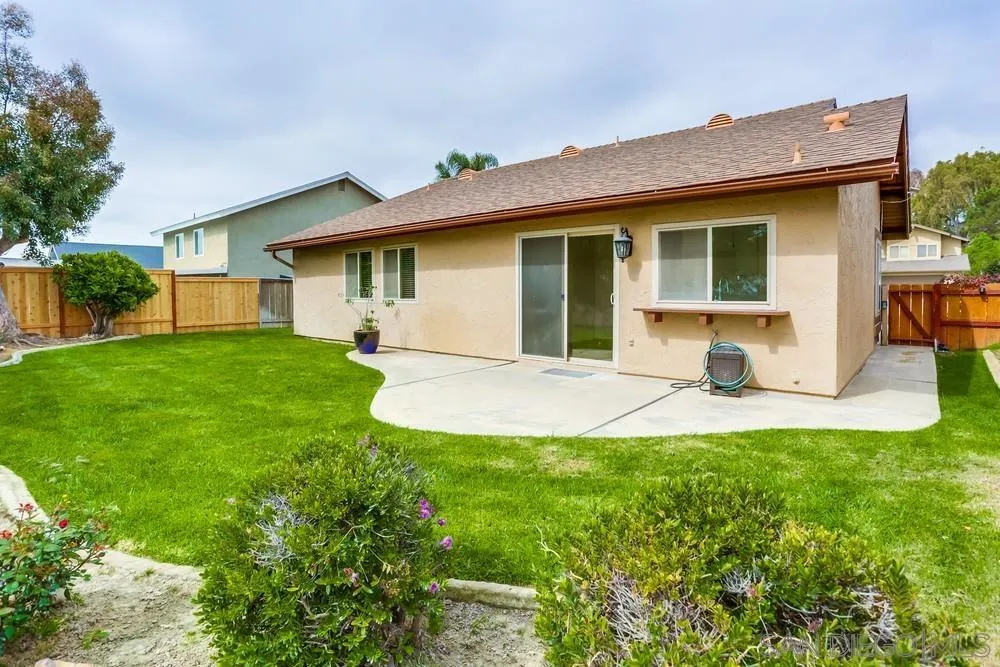384 Compass Road Oceanside, CA 92054 - Photo 29 of 34 a view of a house with a yard and sitting area