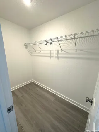 a view of a room with racks on the wall