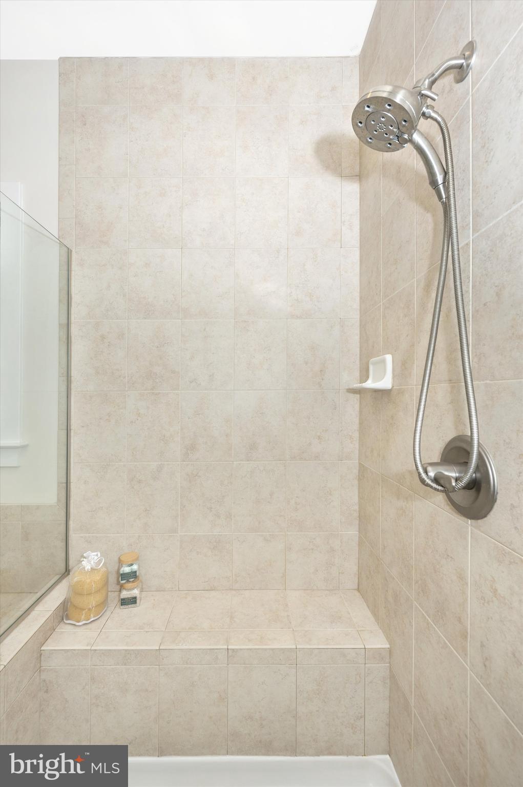 7407 Matapan Drive Hanover, MD 21076 - Photo 16 of 29 Spacious shower and built-in bench!
