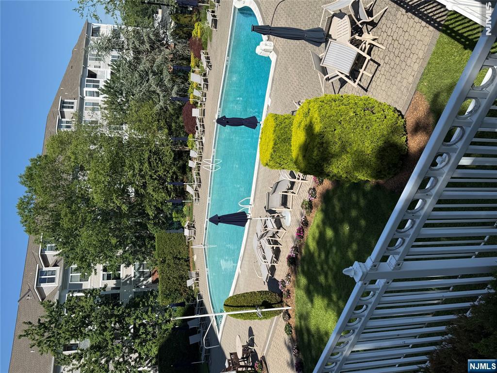 280 South Prospect Avenue, Unit 3N Hackensack, NJ 07601 - Photo 20 of 24 a view of a swimming pool with a patio