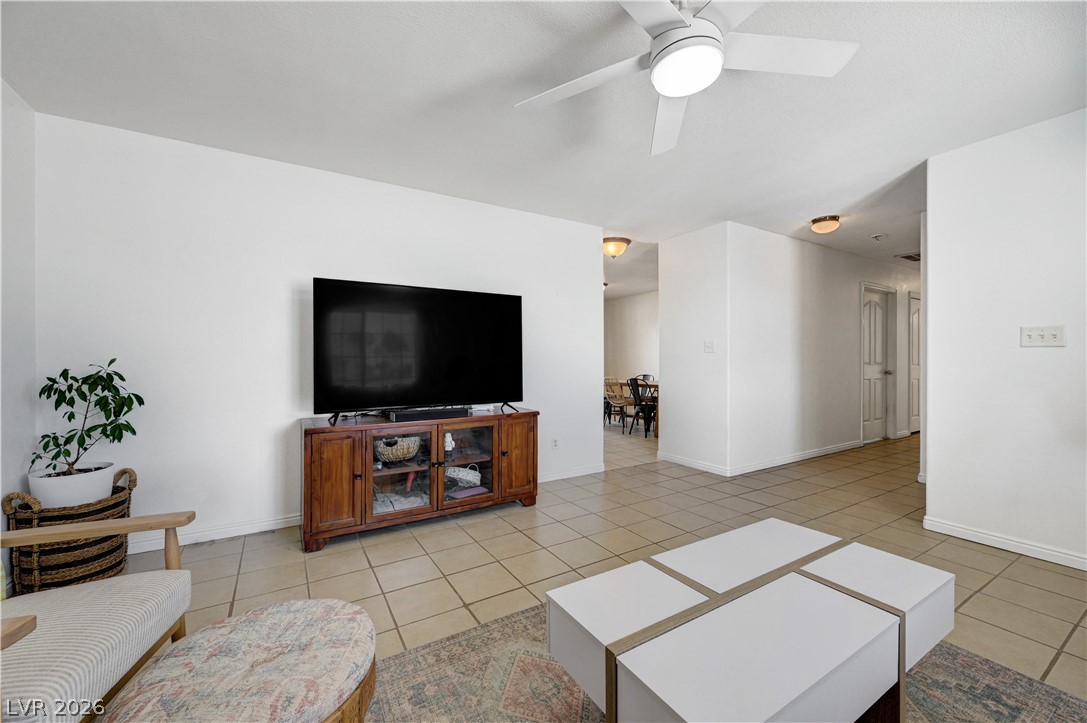 1272 Liston Avenue Logandale, NV 89021 - Photo 11 of 61 A living space offers generous proportions and easy-to-maintain flooring, ideal for dynamic daily living.