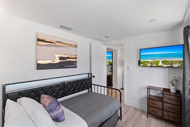 a bedroom with a bed and furniture