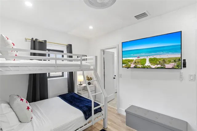 a bed room with a bed and furniture