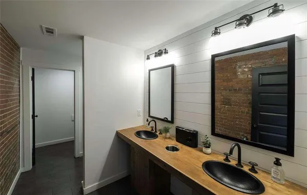 a workspace with furniture and wooden floor