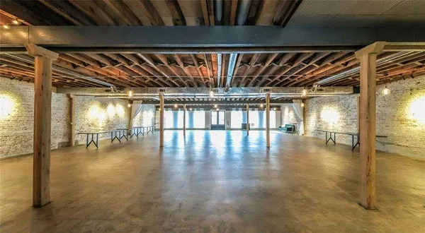 a view of water heater with wooden floor