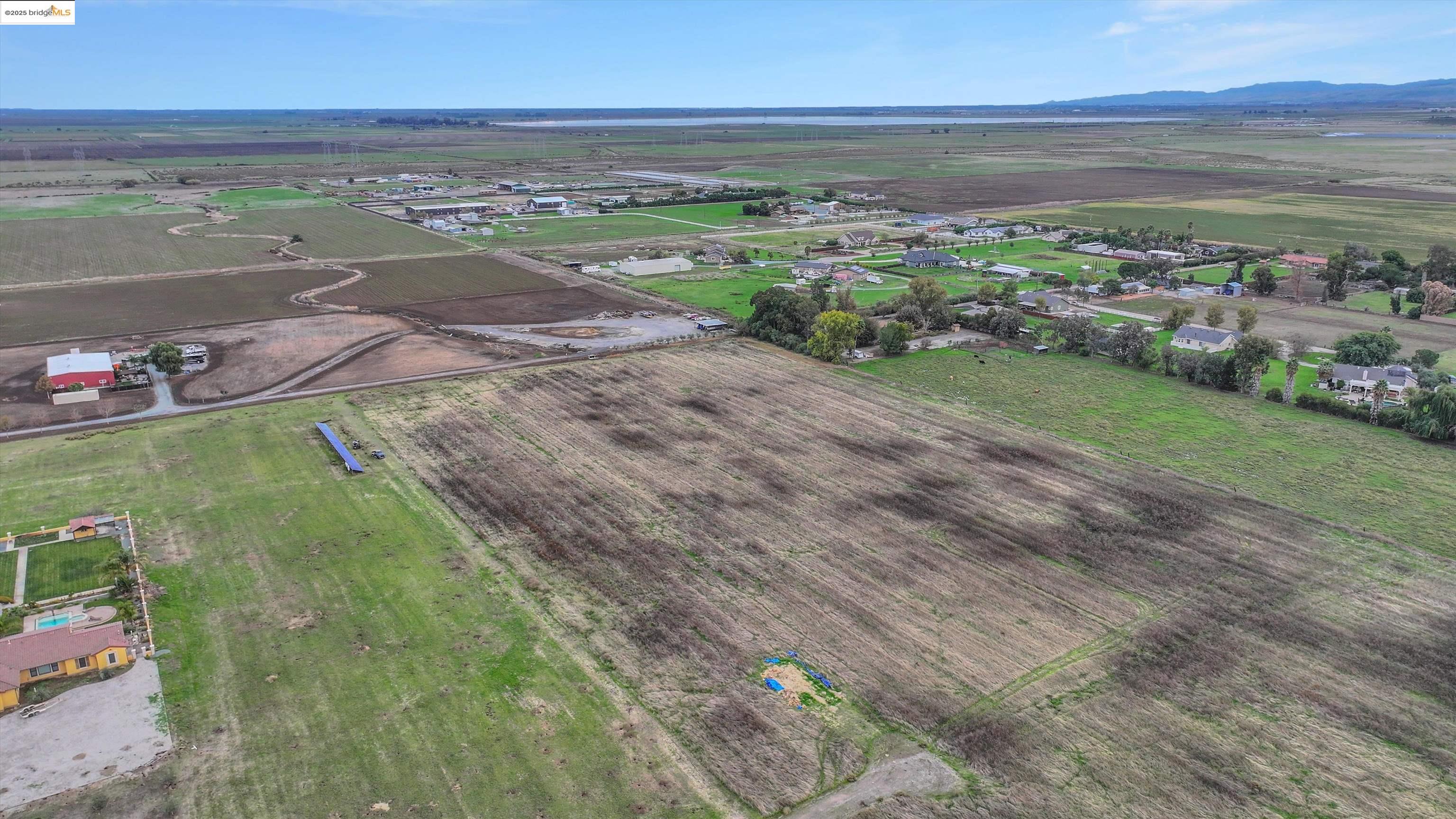 3590 Byer Road Byron, CA 94514 - Photo 5 of 12 View of rural area featuring abundant farmland and a mountain backdrop