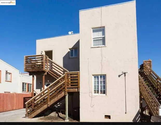 a view of a hallway with windows