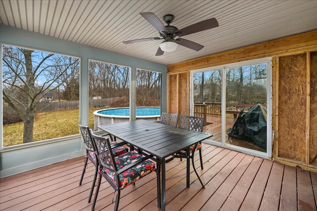 63 Hebb Street Somerset, MA 02725 - Photo 13 of 30 a view of a patio with a table and chairs