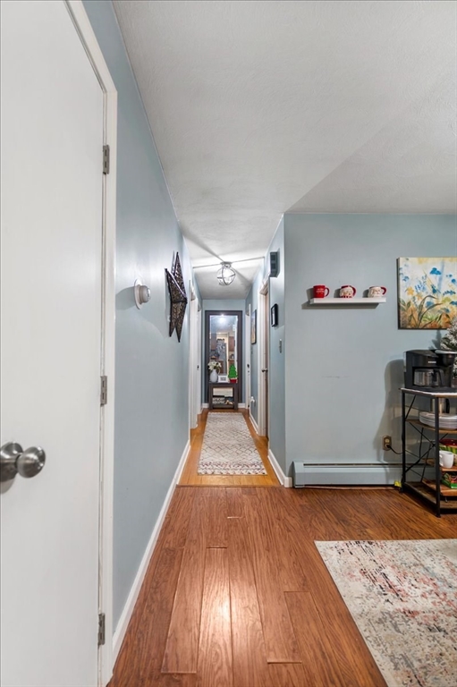 63 Hebb Street Somerset, MA 02725 - Photo 14 of 30 a view of a hallway view with wooden floor and staircase