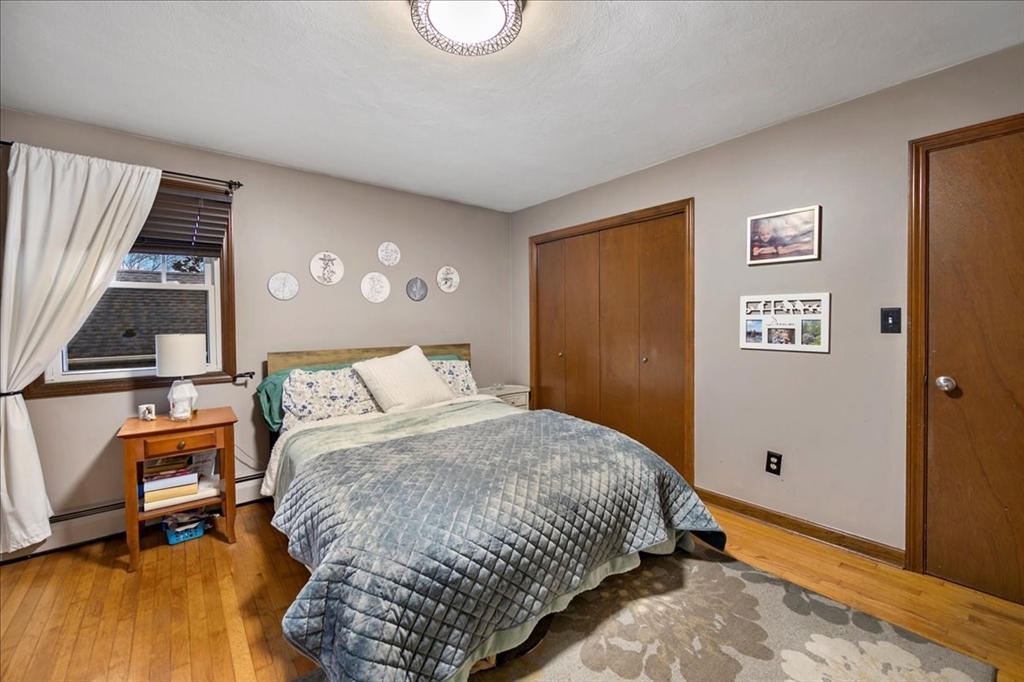 63 Hebb Street Somerset, MA 02725 - Photo 17 of 30 a bedroom with a bed and a window