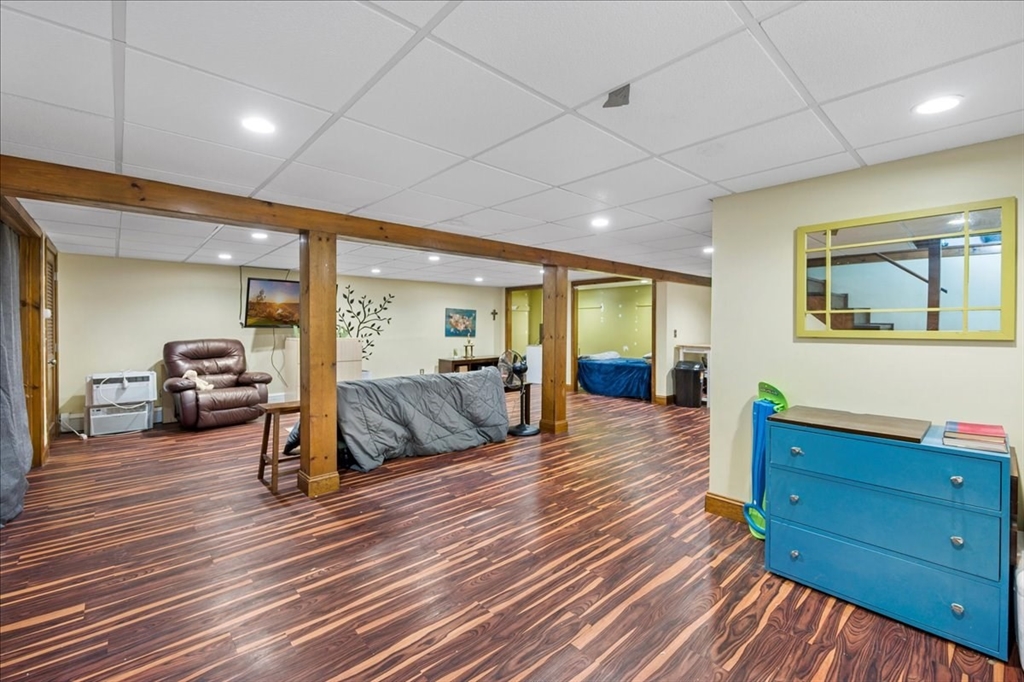 63 Hebb Street Somerset, MA 02725 - Photo 21 of 30 a living room with furniture and a wooden floor