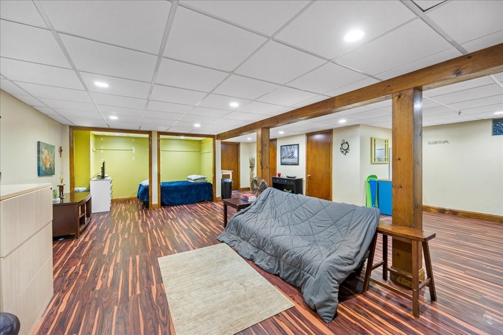 63 Hebb Street Somerset, MA 02725 - Photo 22 of 30 a living room with a couch and wooden floor