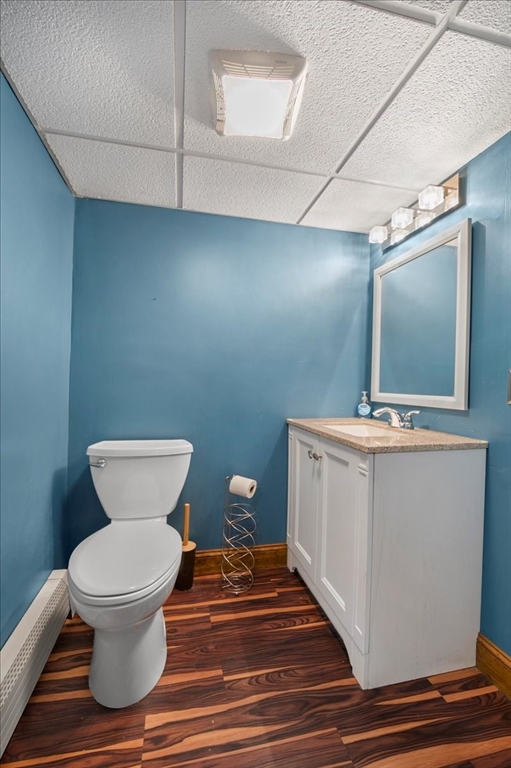 63 Hebb Street Somerset, MA 02725 - Photo 23 of 30 a bathroom with a toilet a sink and mirror