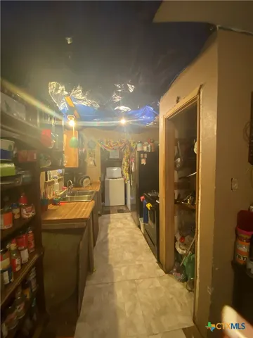 a bathroom with a mirror sink and shower