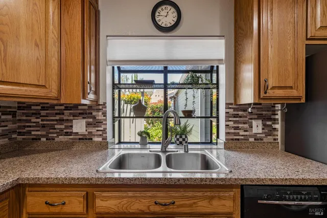 a kitchen with a sink and a cabinets