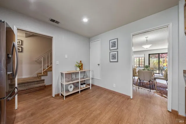 a view of livingroom with furniture and wooden floor