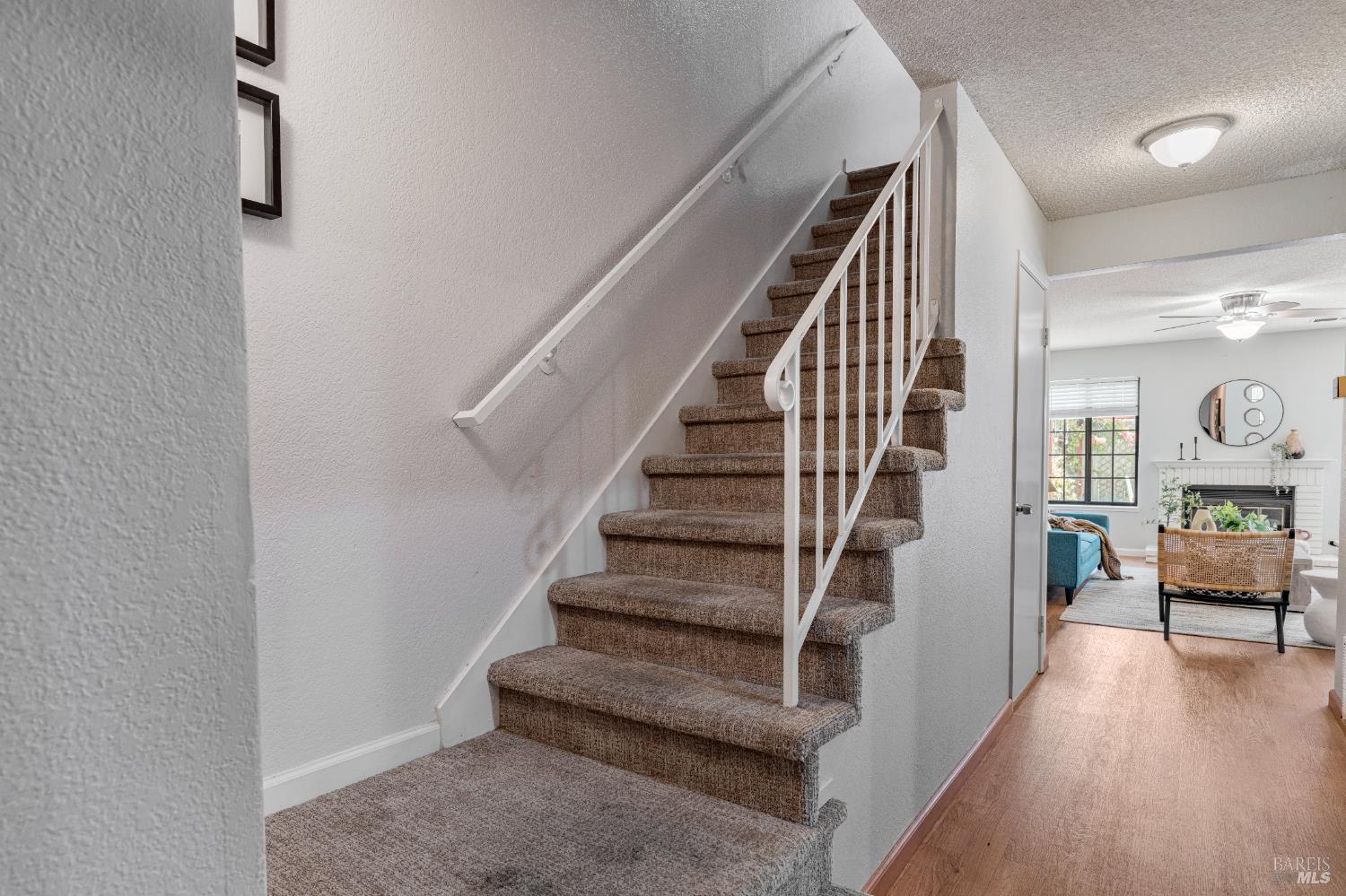 1740 Stuart Court Benicia, CA 94510 - Photo 16 of 38 a view of entryway and hall with wooden floor