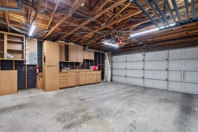 a view of backyard with sitting area and furniture