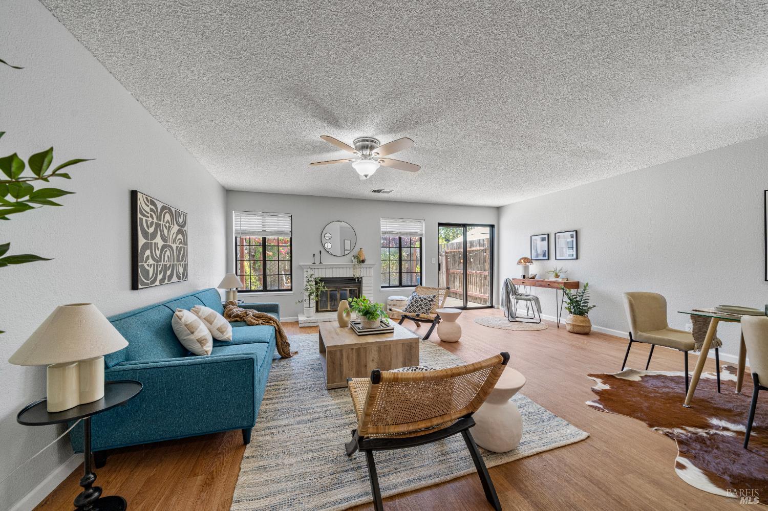 1740 Stuart Court Benicia, CA 94510 - Photo 3 of 38 a living room with furniture and a wooden floor
