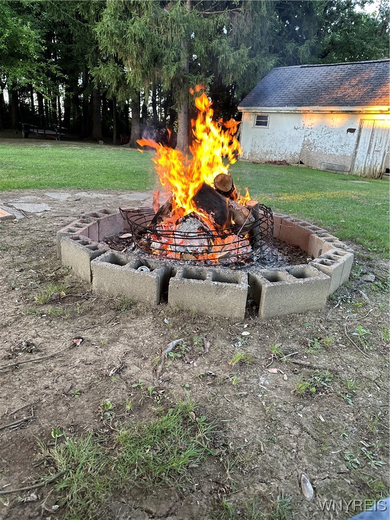 1009 Two Rod Road, Unit S Marilla, NY 14102 - Photo 44 of 47 Firepit in summer.