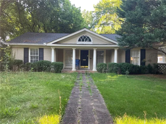 a view of a house with garden