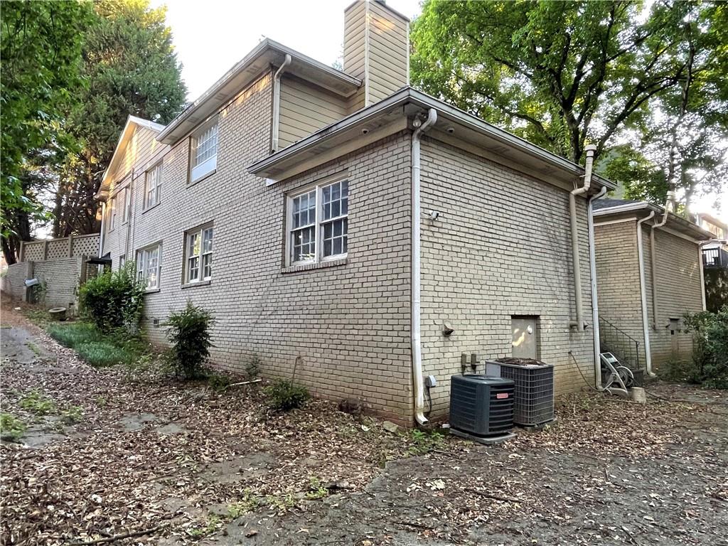 25 26th Street Northwest Atlanta, GA 30309 - Photo 5 of 6 a view of a house with a yard