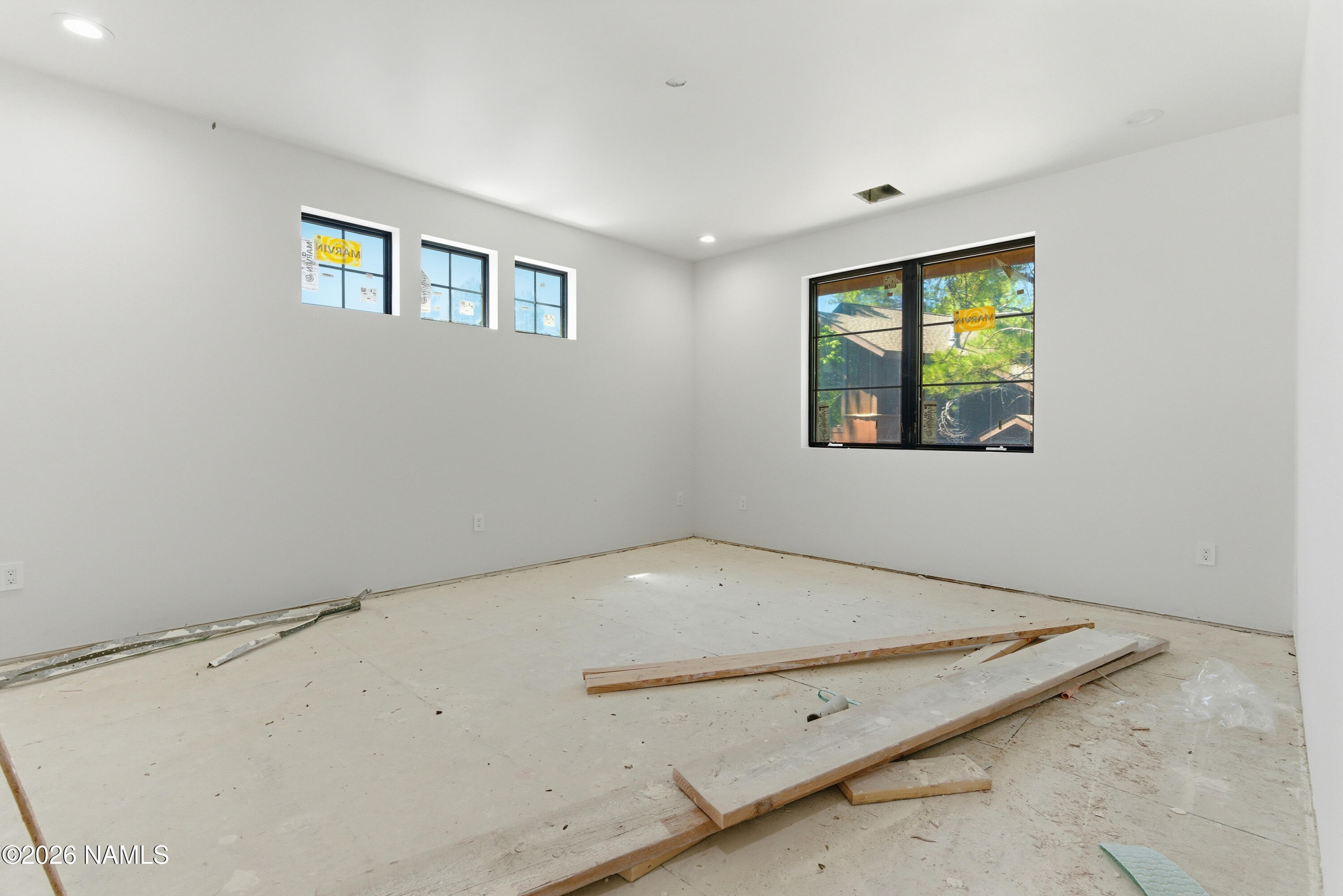 2380 East Del Rae Drive Flagstaff, AZ 86005 - Photo 13 of 26 a view of a room that has a window in it