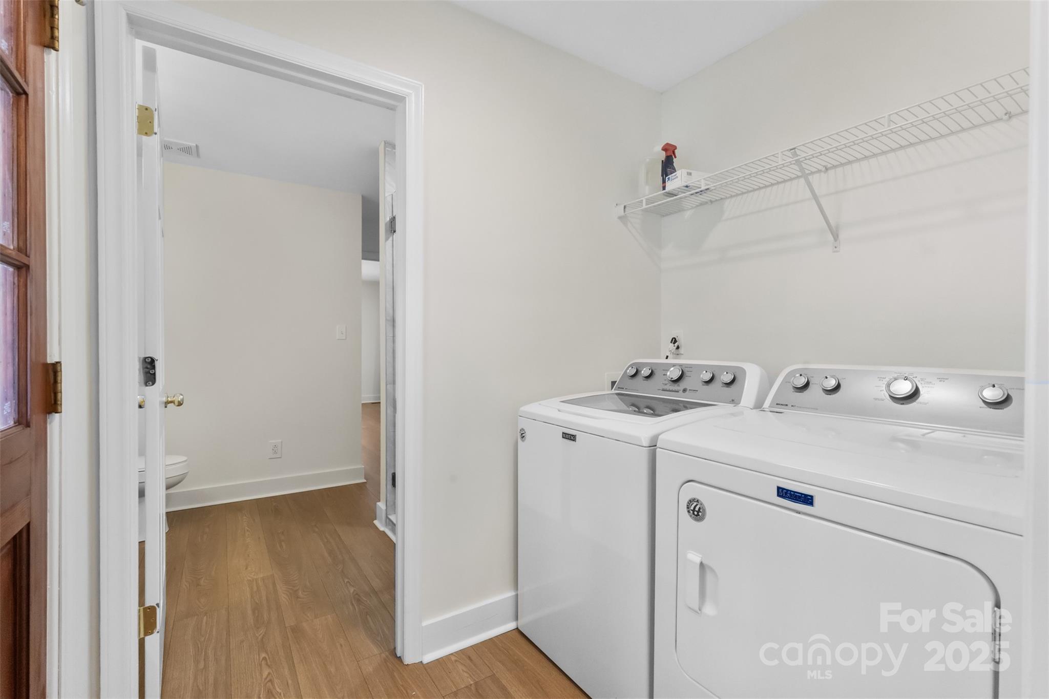 3407 Stonegate Road Monroe, NC 28110 - Photo 15 of 34 a view of storage and utility room with washer and dryer