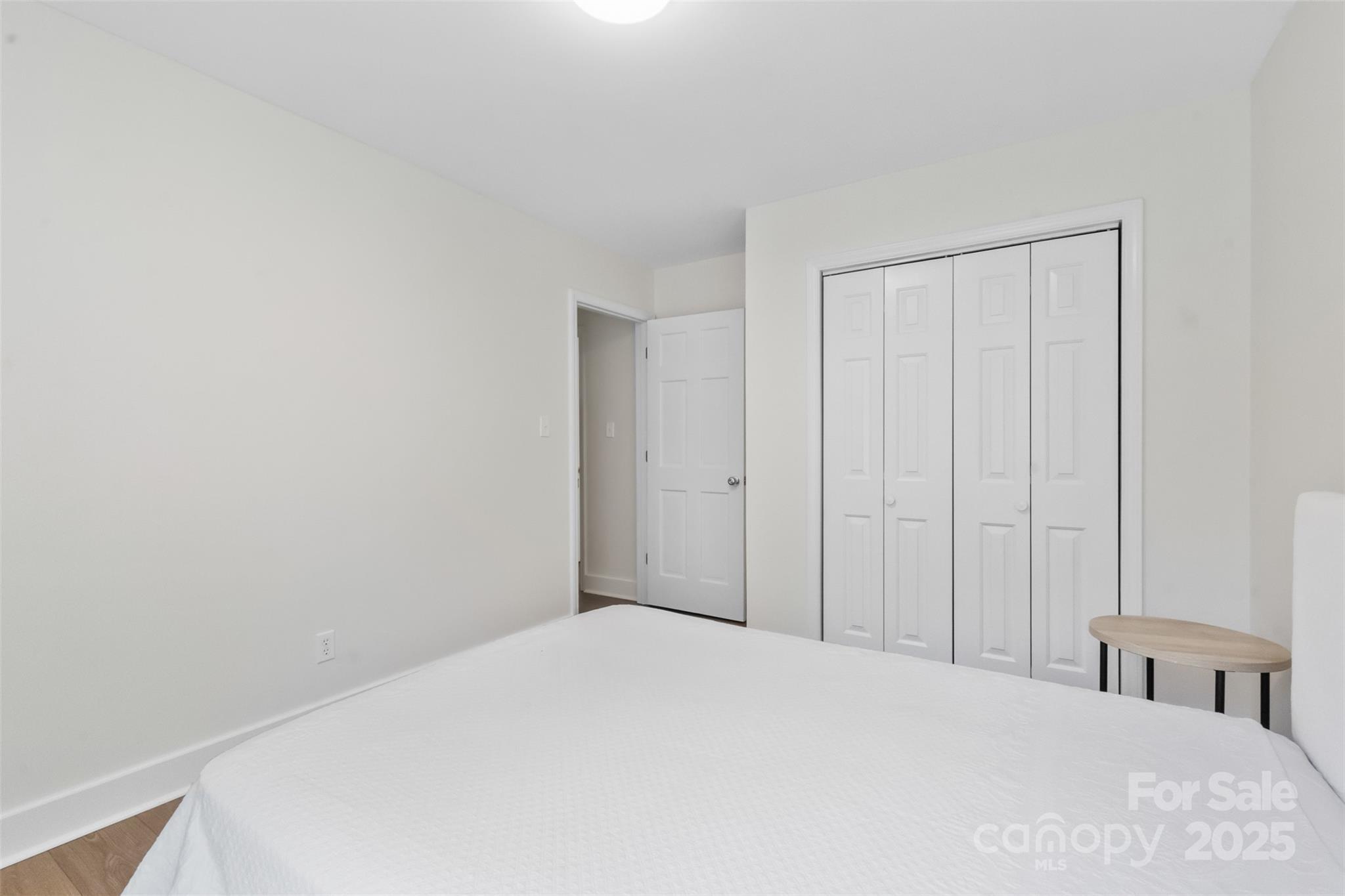 3407 Stonegate Road Monroe, NC 28110 - Photo 23 of 34 a bedroom with a bed and a closet