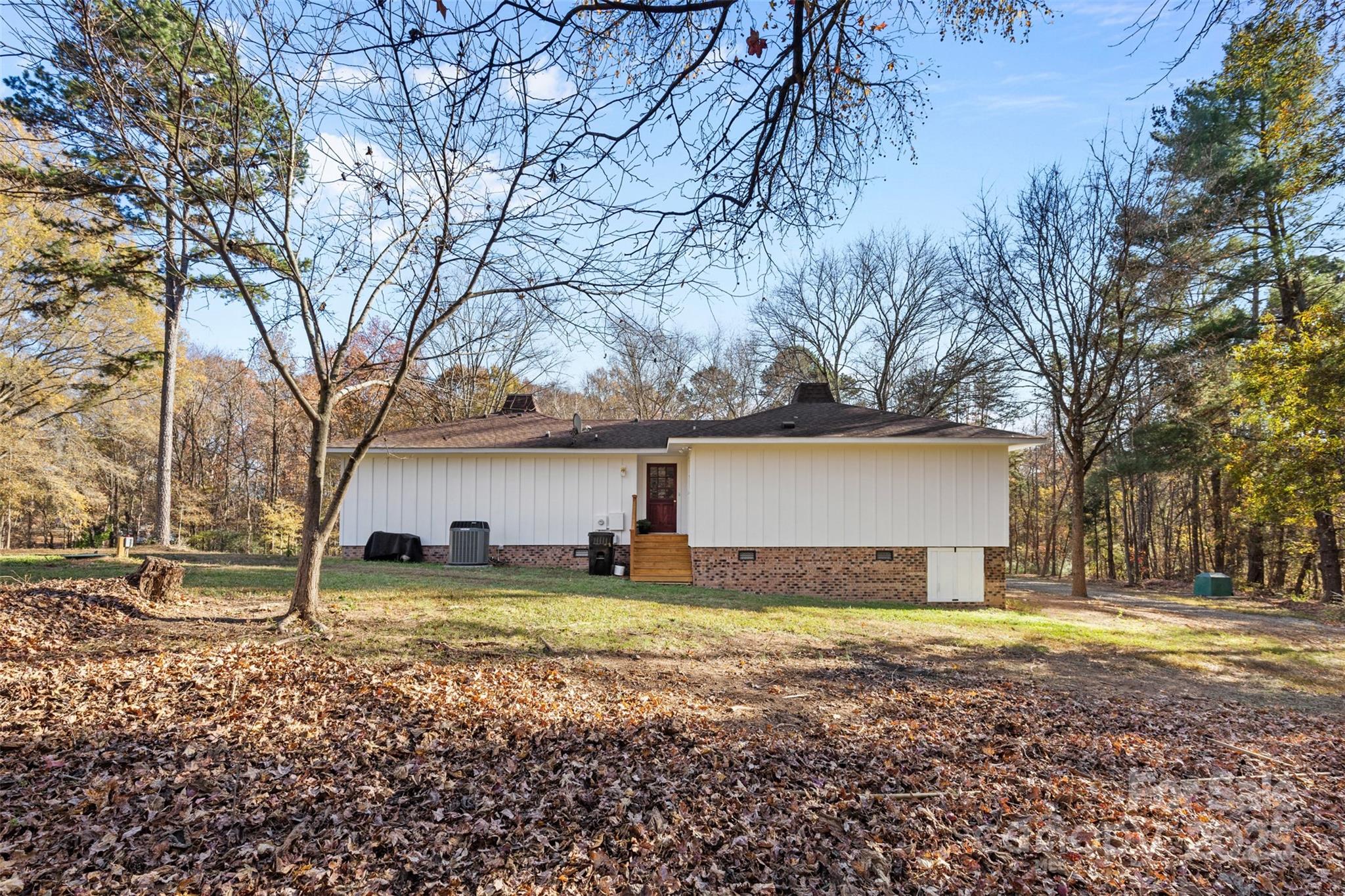 3407 Stonegate Road Monroe, NC 28110 - Photo 26 of 34 a view of a house with a yard covered with snow