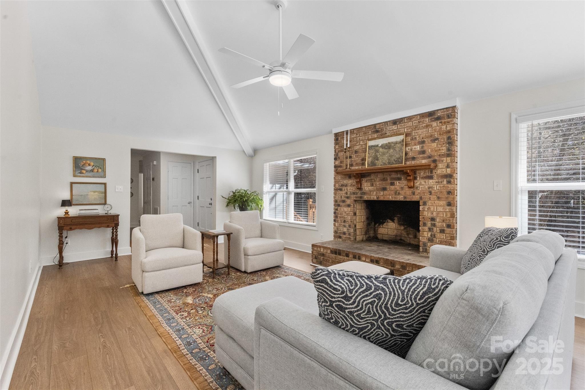 3407 Stonegate Road Monroe, NC 28110 - Photo 4 of 34 a living room with furniture and a fireplace