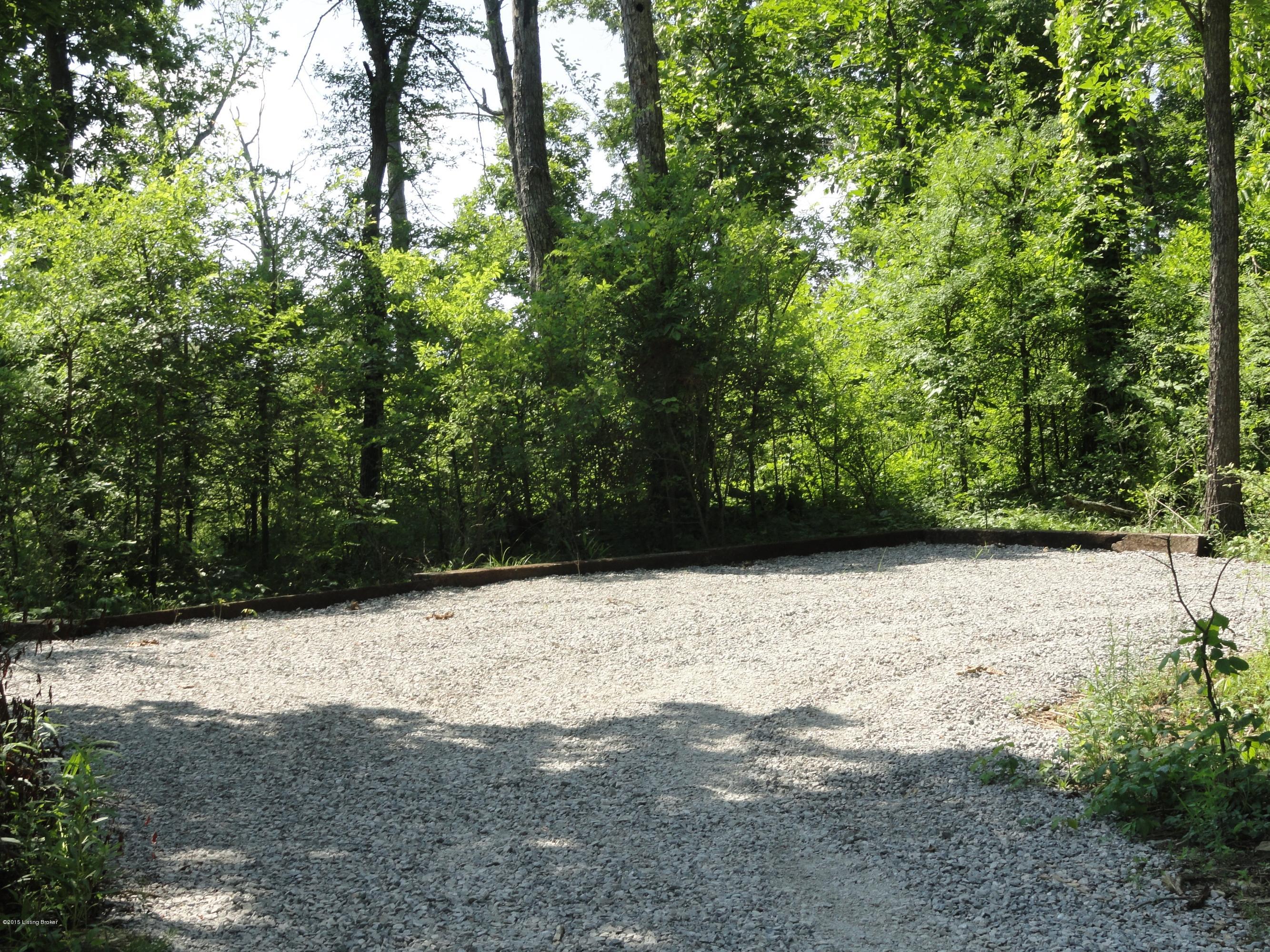 307 Lake Side Road Clarkson, KY 42726 - Photo 21 of 25 Room to park golf carts near dock area.