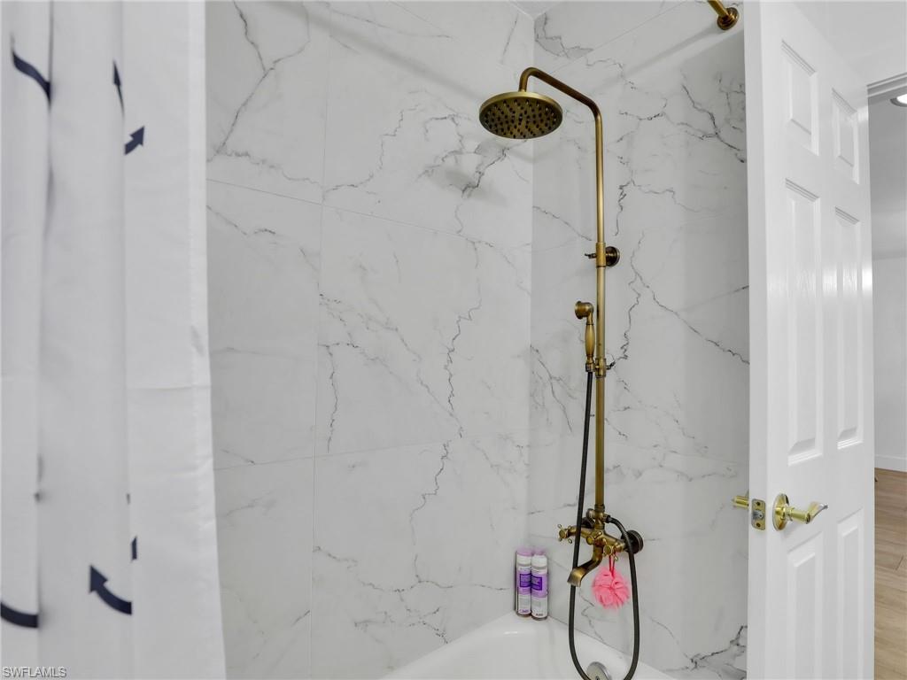 9831 Alabama Street, Unit 5 Bonita Springs, FL 34135 - Photo 22 of 28 View of bathroom