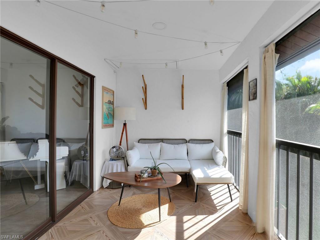 9831 Alabama Street, Unit 5 Bonita Springs, FL 34135 - Photo 25 of 28 View of sunroom