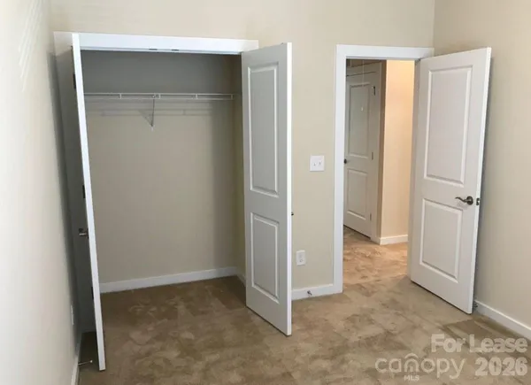 an empty room with closet