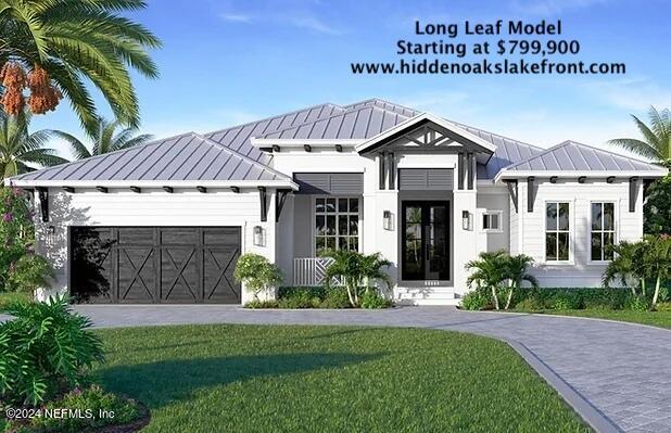 10 Southeast 265th Court Road Umatilla, FL 32784 - Photo 2 of 38 a front view of a house with a garden and plants