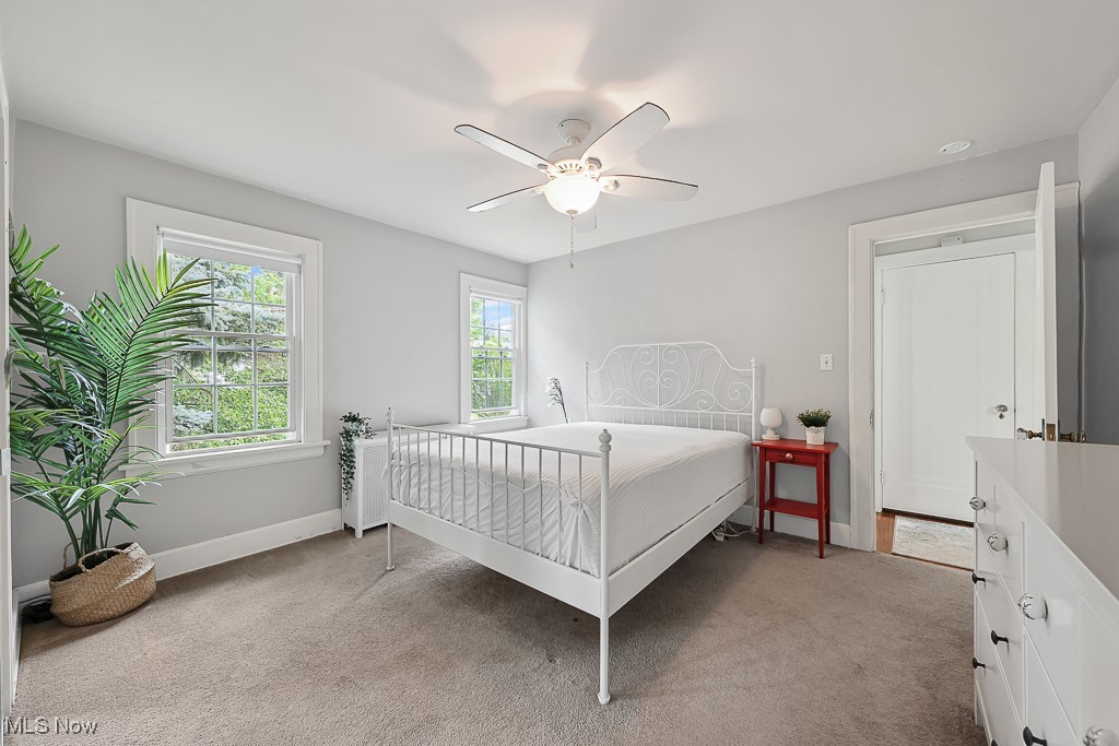 3266 Avalon Road Cleveland, OH 44120 - Photo 37 of 46 Bedroom with light carpet and a ceiling fan