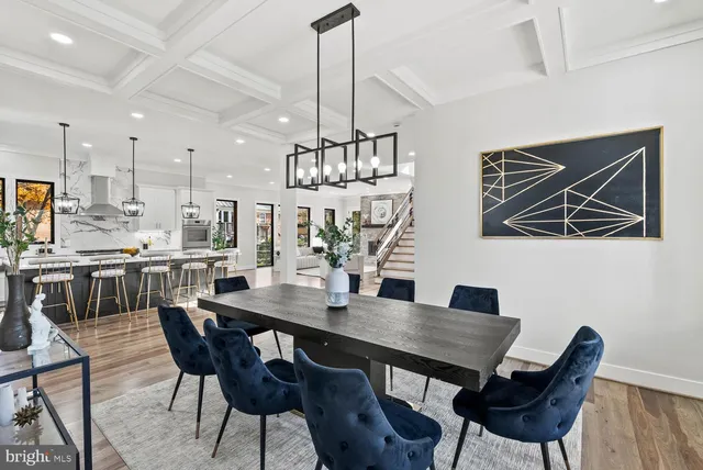 a spacious bedroom with a large bed and a couch