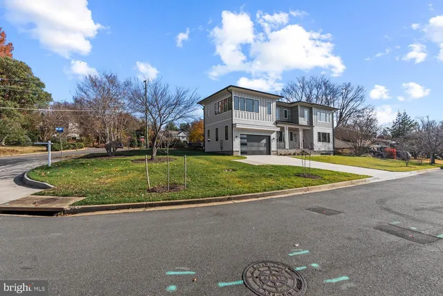 a swimming pool view with a outdoor seating space