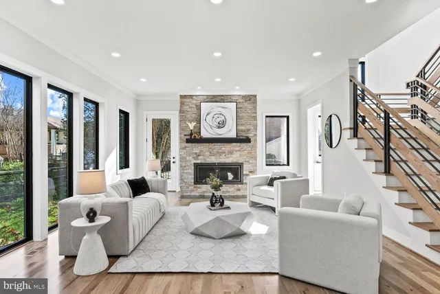 a large kitchen with lots of counter space and windows
