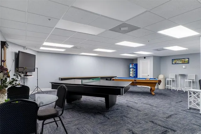 a view of a lake with tall buildings