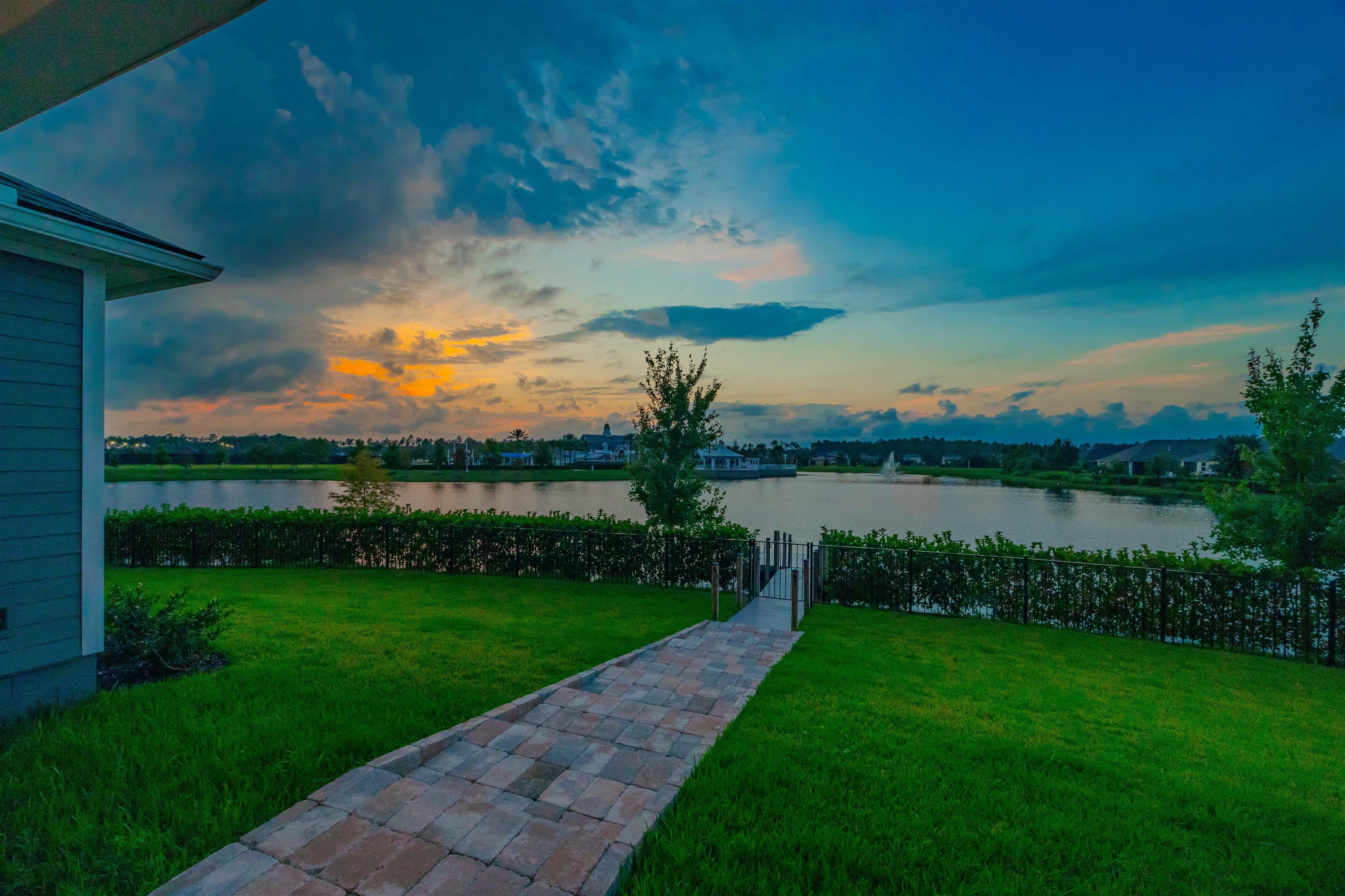 194 Snowbell Court St. Augustine, FL 32095 - Photo 13 of 75 a view of a lake with a big yard