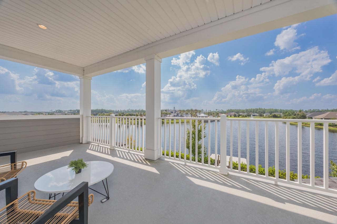 194 Snowbell Court St. Augustine, FL 32095 - Photo 23 of 75 a balcony with furniture and a potted plant