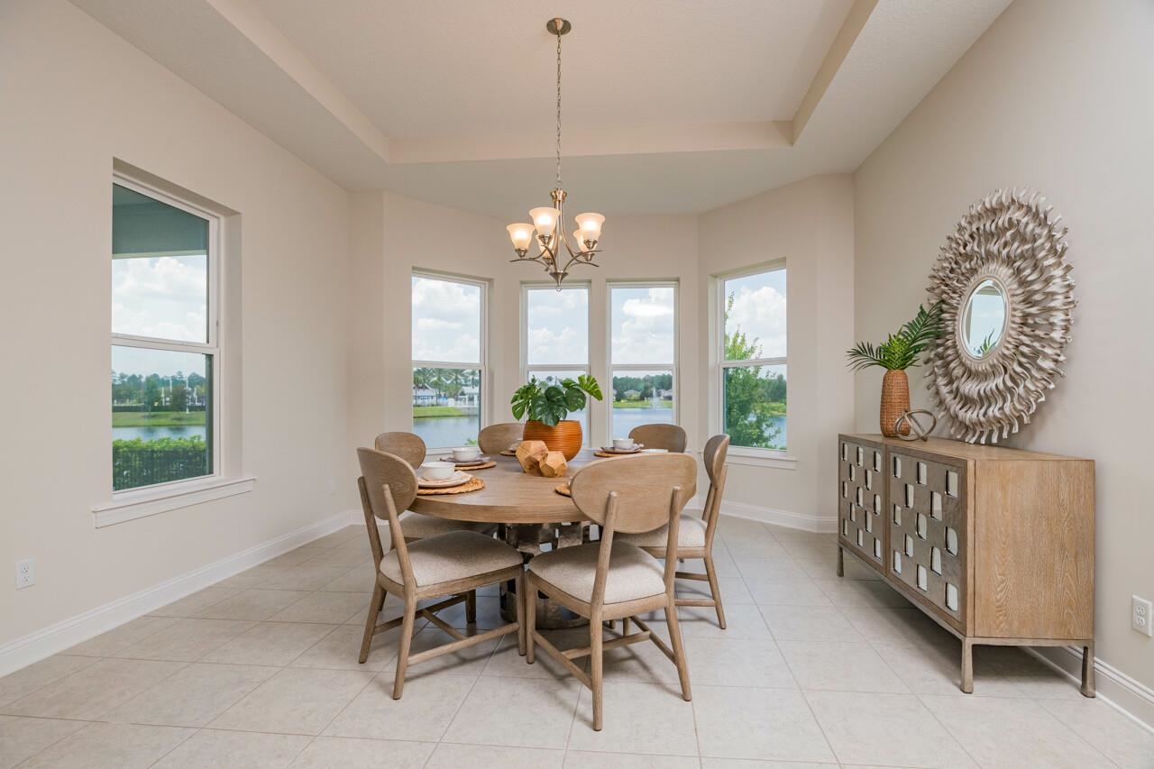 194 Snowbell Court St. Augustine, FL 32095 - Photo 32 of 75 a view of a dining room with furniture window and outside view