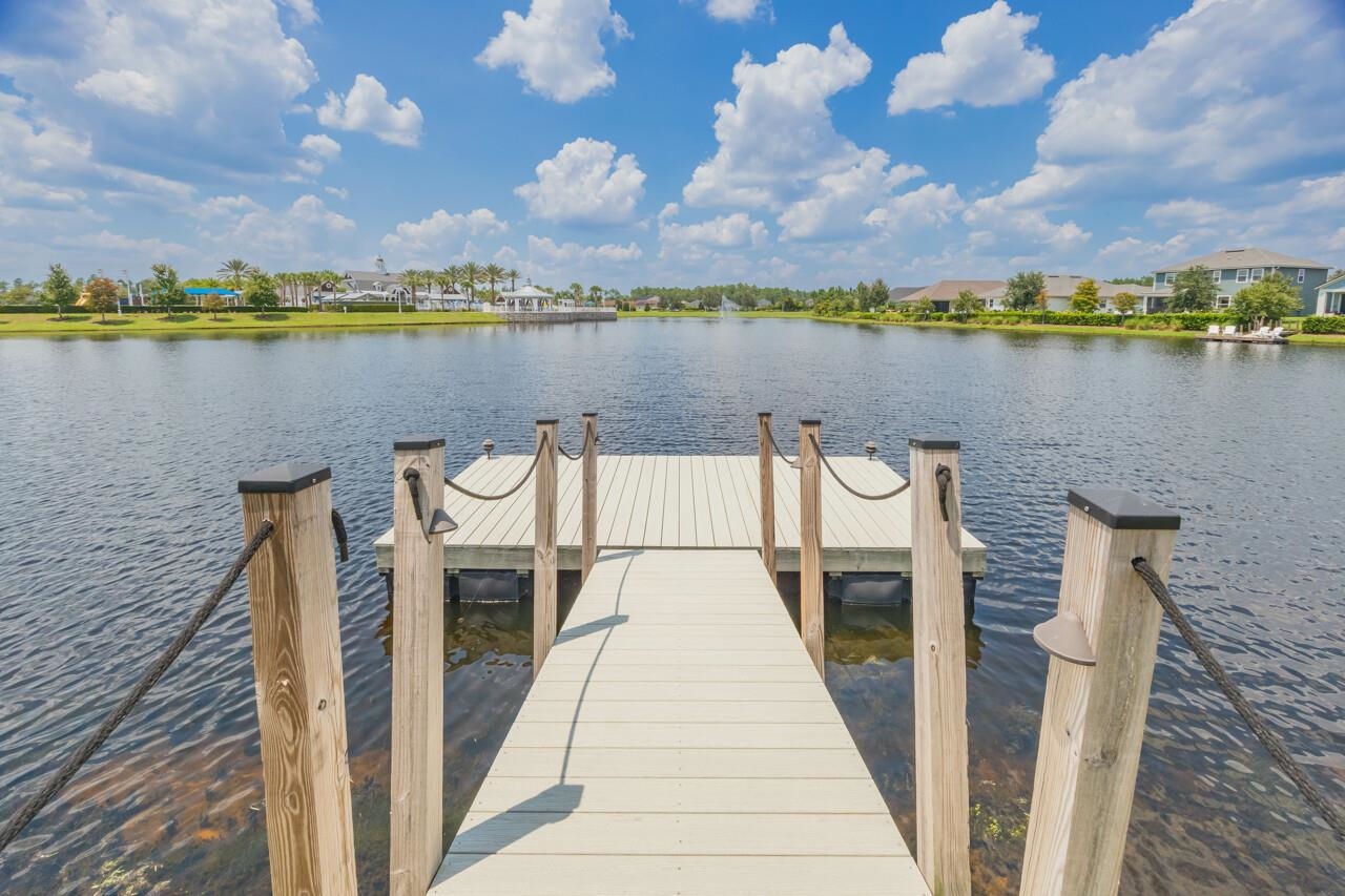 194 Snowbell Court St. Augustine, FL 32095 - Photo 43 of 75 a view of a lake with houses in front of it